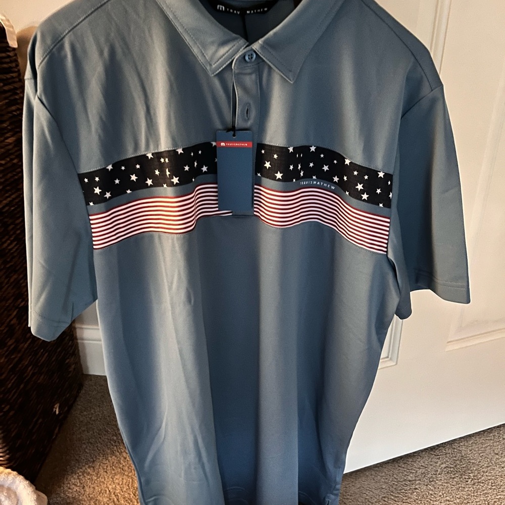 Travis Mathew Blue Polo with Star and Stripe Design